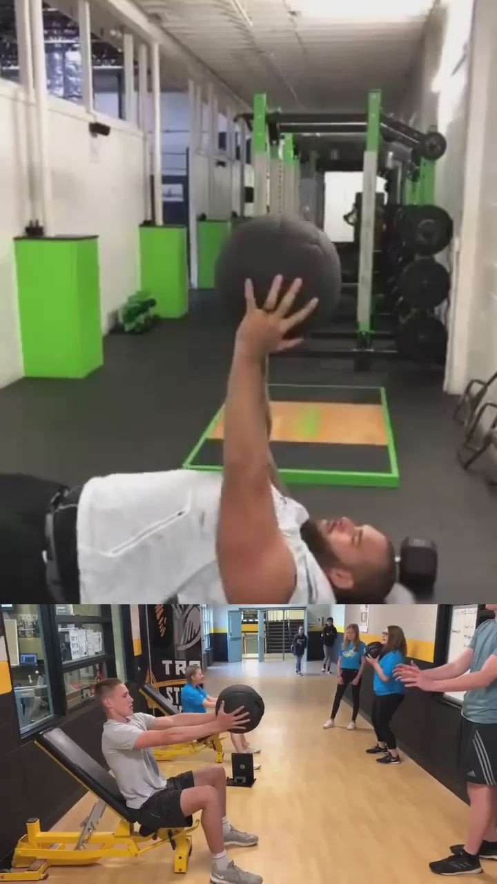 NFL defensive lineman to high school quarter back using the original Ballistic Ball to assess upper body explosiveness.